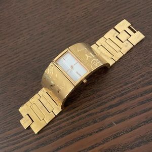 Gold DKNY cuff watch